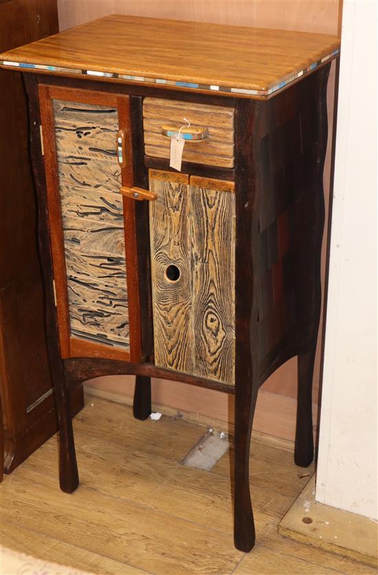 A contemporary painted wood side cabinet, monogrammed T.W. W.60cm